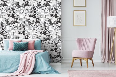 bedroom with black-and-white floral wallpaper