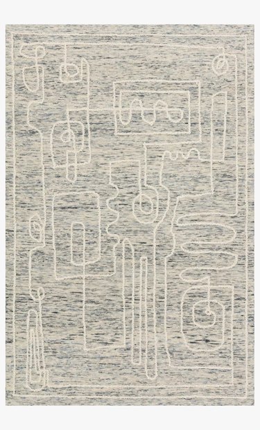 white rug with doodles