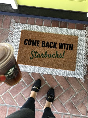 Come Back with Starbucks fall doormat with gray and white rug underneath