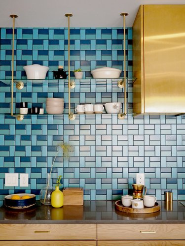 midcentury modern kitchen with blue backsplash