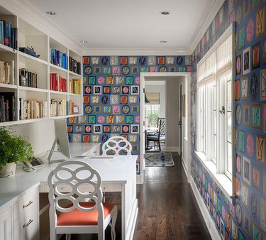 Built-in bookcases in a home office library designed by Massucco Warner