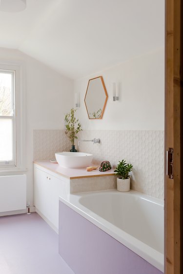 A Pink Pivot Door and Cork Walls? We Are Officially Smitten With This ...