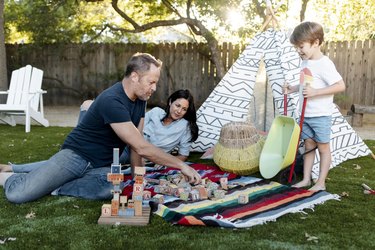 Gary, Lisa and Ronan in their backyard.