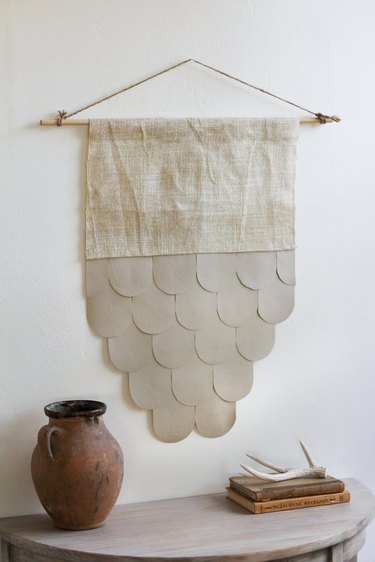 burlap and faux leather wall hanging