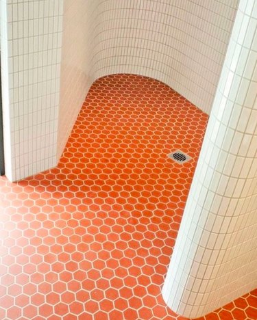 orange shower tile with white tile