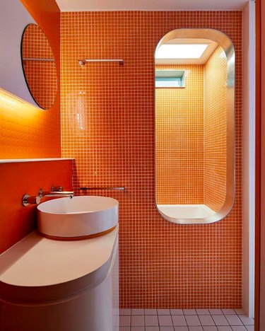 small orange tiles in bathroom