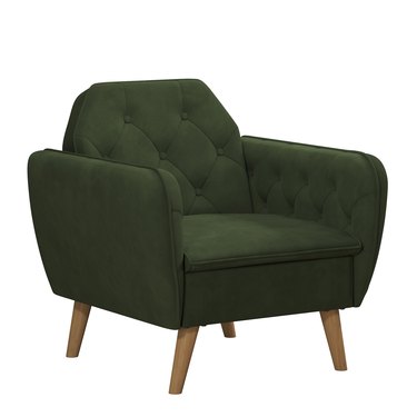 green tufted armchair