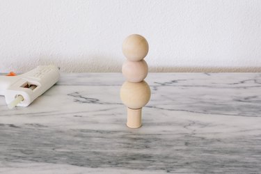 Gluing wooden beads to wooden spool