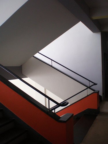 Bauhaus architecture with modern stairwell in red and black