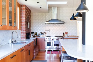 kitchen with brick fireplace