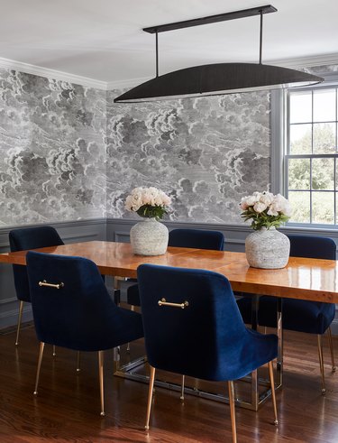 Contemporary gray dining room idea with gray cloud wallpaper