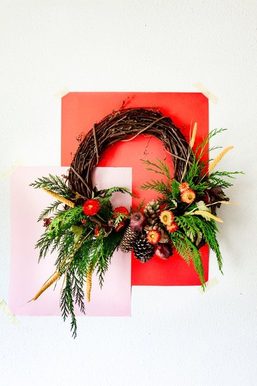 Autumnal wreath using a grapevine wreath and fresh flowers.