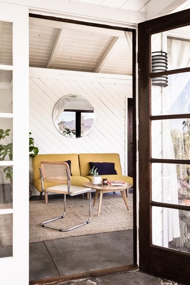 midcentury living room with cantilever bauhaus chair