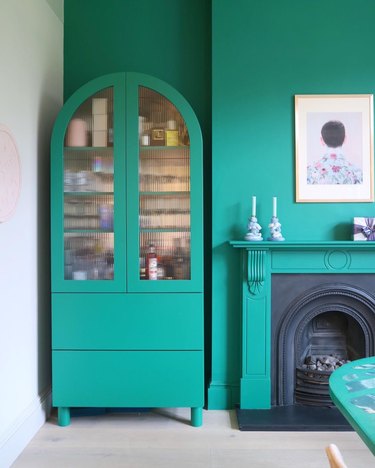 green cabinets against matching green walls Tone On Tone Paint Ideas