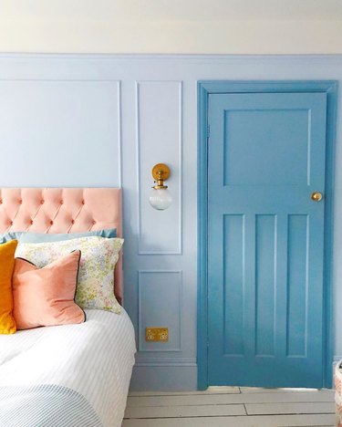 blue pastel bedroom with darker blue door frame Tone On Tone Paint Ideas