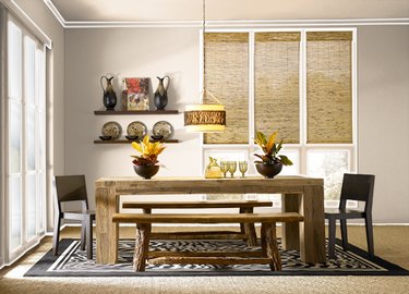 dining room space with beige walls and wooden table