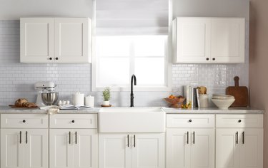 Farmhouse kitchen with white cabinets