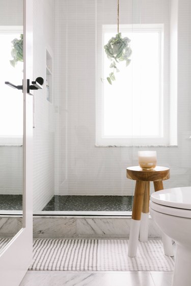 white Scandinavian bathroom flooded with natural light