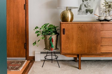 This DIY tasseled basket can be used as a planter or for storage—you choose!