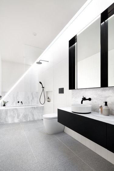 black and white Scandinavian bathroom with floating vanity