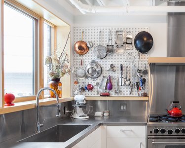 pegboard organizer in kitchen