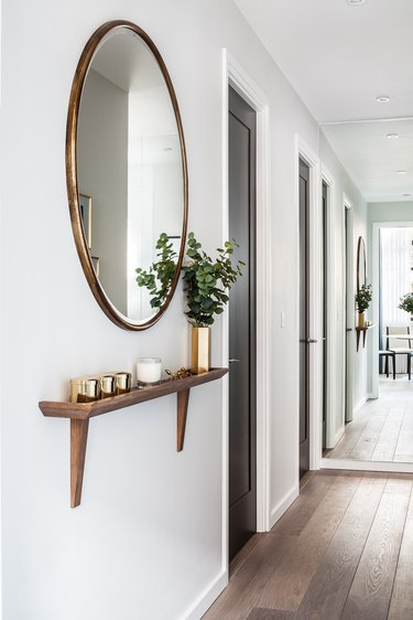 Bespoke shelf in entryway by Gordon-Duff & Linton