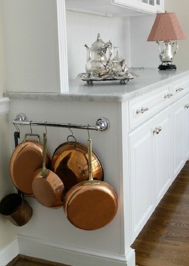 pot storage on side of cabinets