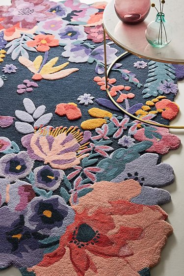 dining room rug idea with low-pile in a floral pattern with vibrant colors