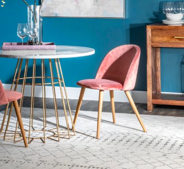 dining room rug idea with oversize rectangular option beneath circular table