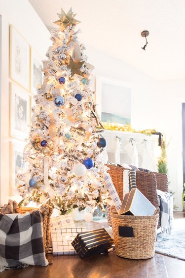 White Christmas Tree Ideas with White Christmas trees with light colored ornaments, basket, presents.