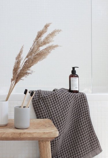 bathroom with gray waffle weave bath towel