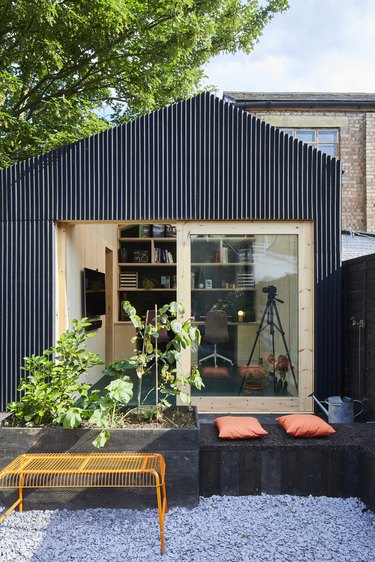 black East London home office shed with glass windows