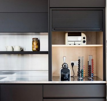 how to organize kitchen cabinet cubby in black contemporary space