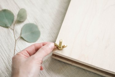 Tightening wing nut on the flower press