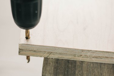 Drilling hole through two plywood boards stacked together