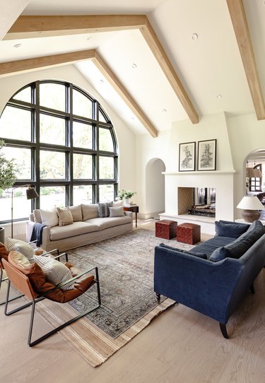 a-frame living room with arched window