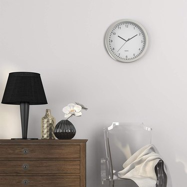 Wall clock with hidden storage