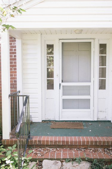 Concrete porch painted hunter green