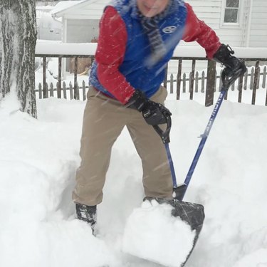 man shoveling
