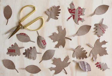 Leaf shapes cut out of recycled paper bag