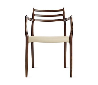 chair with brown legs and beige seat