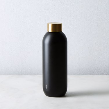 Stelton Brass and Stainless Steel Water Bottle, $35