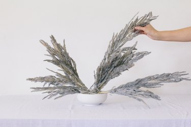 Adding pampas grass to vase