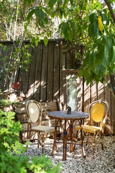 Two chairs sit on the farmstead property at Kawalek and Navarro's home