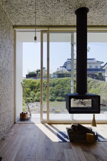 square-shaped hanging fireplace in small home living room