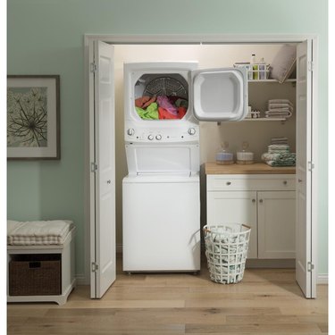Compact washer and dryer in closet.