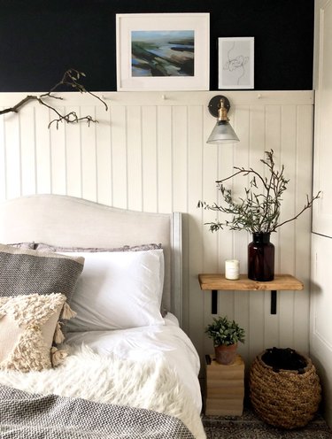 dark blue country bedroom idea with white tongue and groove wall panelling