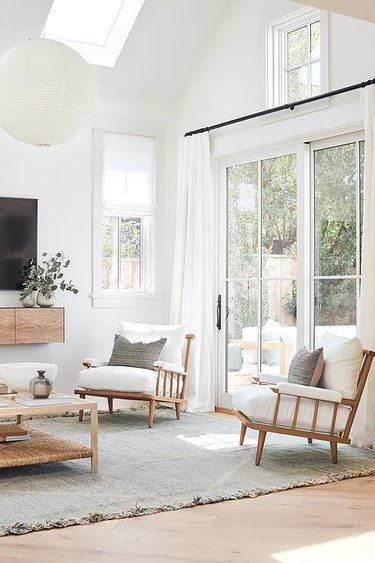 Scandinavian living room with natural light from windows and skylights