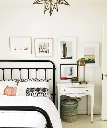 House Seven Design iron bed frame paired with vintage nightstand