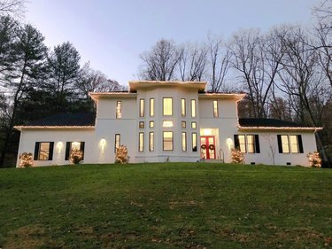 Christmas light ideas on white house in field